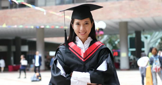 Woman get graduation in university on ceremony day