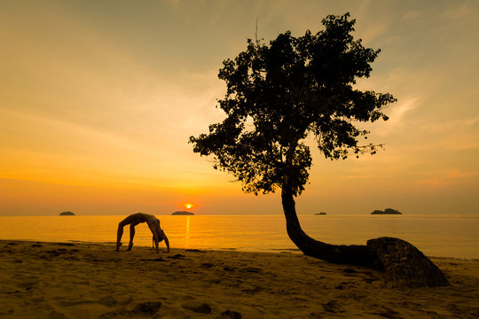 Sunset yoga session Koh Chang in Thailand