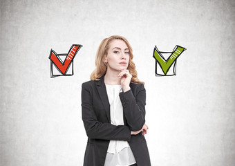 Pensive red haired businesswoman, choice