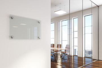 White meeting room with a company name