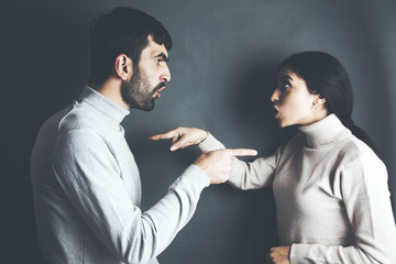 Angry couple are shouting at each other