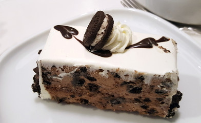 Cream Cheese Cake on top with chocolate cream cookie