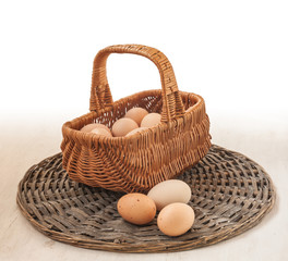 Goose eggs in the basket on a cooking table