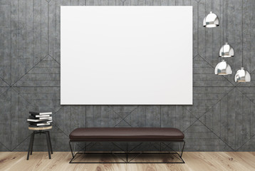 Gray room with a poster and a bench