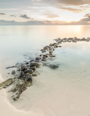 sunset on the rocks, paradise beach