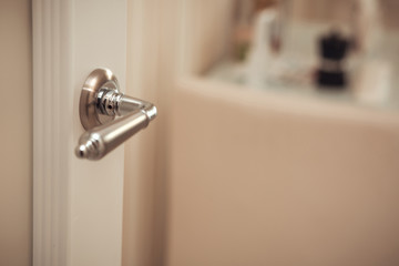 Obraz premium Closeup shot of modern partition door handle. Empty space