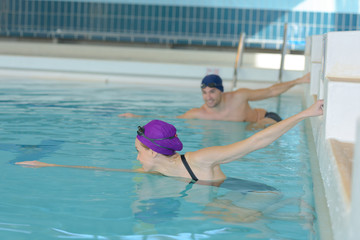 Naklejka premium couple of swimmer swimming in pool