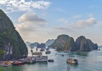 Tourist Sailboat junks Ha Long bay green island Halong mountains Vietnam. 