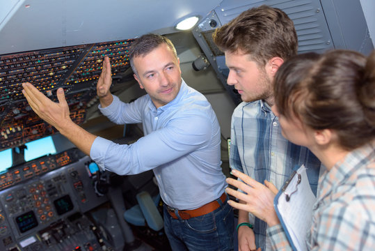 Students being shown overhead control panel