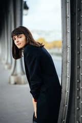 Obraz premium Beautiful fashion young elegant French woman in Paris outdoors