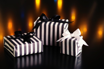 Christmas gift boxes on a dark background.