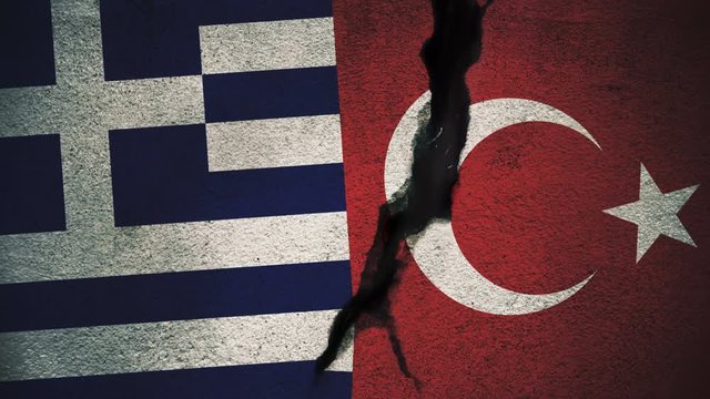 Greece vs Turkey Flags on Cracked Wall