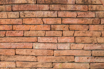 Red old brick wall in temple