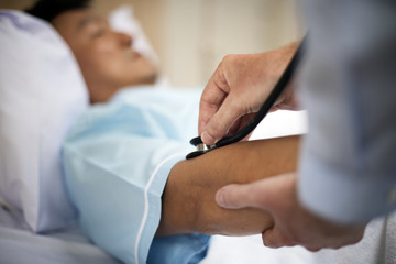 Obraz na płótnie Canvas Doctor is checking patient symptom