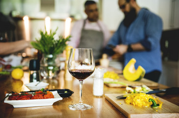 Group of friends are cooking in the kitchen