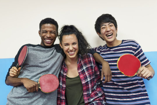 Friends playing table tennis