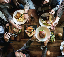 Group of friends eating together