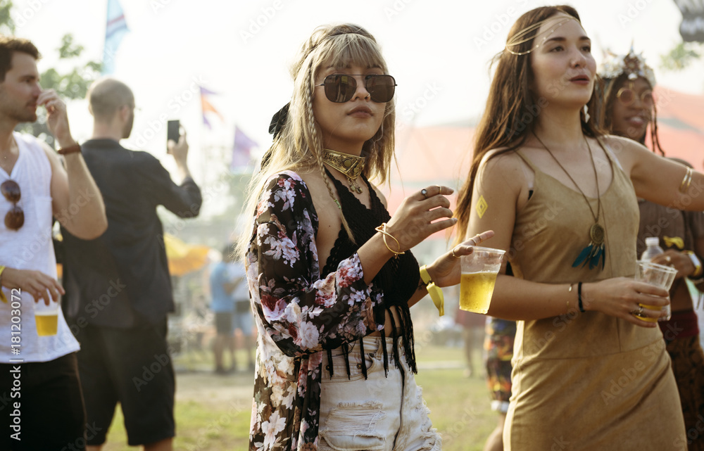 Wall mural diverse group of people enjoying a road trip and festival