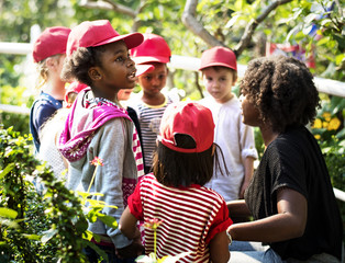 Teacher and kids school learning ecology gardening