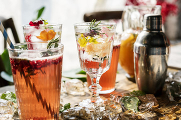 Summer cocktails with decorative flower petals