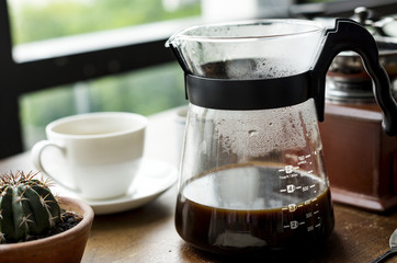 Closeup of coffee jar by the window