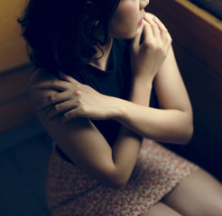 Naklejka premium Young feminine asian woman inside the train