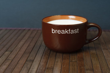 a cup for breakfast with milk