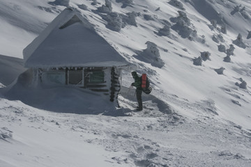 winter hiking in the mountains. tourism in the winter mountains