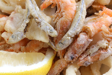 fried fish at the takeaway restaurant and a lemon