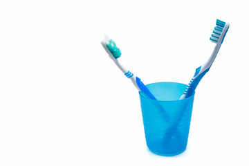 Image of used old and new toothbrushes isolated on a white background