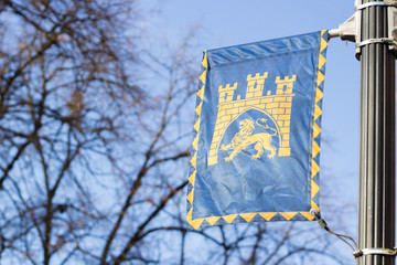 The coat of arms of the Ukrainian city of Lviv flutters in the wind