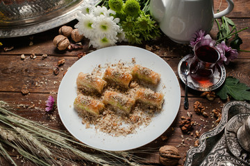 Baklava traditional oriental dessert. Tea and turkish pastry breakfast concept