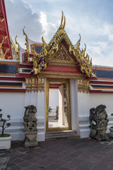 Door or entrance to Wat Pho Chinese and Thai Buddhist temple style in Bangkok, Thailand