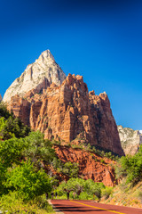 Bright scenery in Zion National Park, Utah, with deep blue skies and red rock formations
