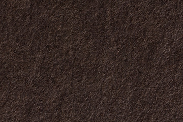 Recycled dark brown paper background.