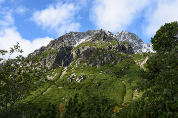 mountain tops in  autumn covered in mist or clouds