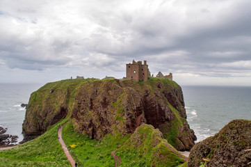 Fototapeta na wymiar Ruins of Dunnottar Castle in Scotland built on a rock above the sea