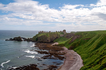 Ruins of Dunnottar Castle in Scotland built on a rock above the sea