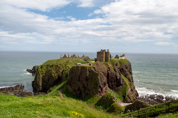 Ruins of Dunnottar Castle in Scotland built on a rock above the sea