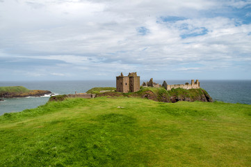 Ruins of Dunnottar Castle in Scotland built on a rock above the sea