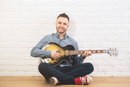 Handsome man with guitar