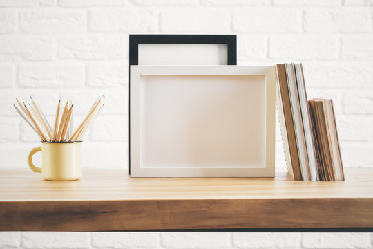 Desk top with picture frame and supplies