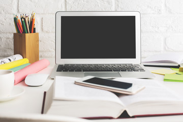 Light desktop with laptop screen