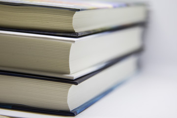 A beautiful closeup of a book. Stack of books. Shallow depth of field photo.