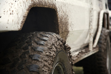 Fototapeta na wymiar Driving Off Road Car in the mud