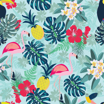 Decorative pattern with flamingo, pineapple, toucan and monstera leaves.