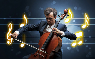 Young cellist with music sheet