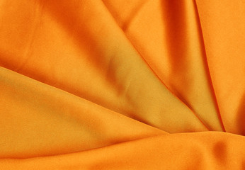 bright orange silk fabric overflowing