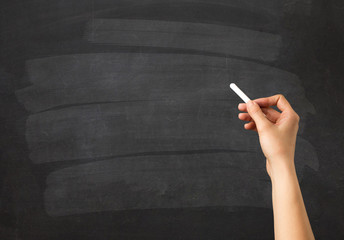 Naklejka premium Hand holding chalk