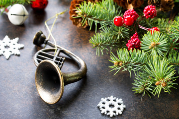 Christmas composition. Christmas tree and decorative ornaments on a dark stone and slate background.